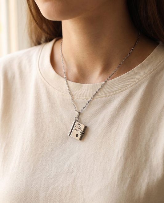 My Little Star book necklace worn