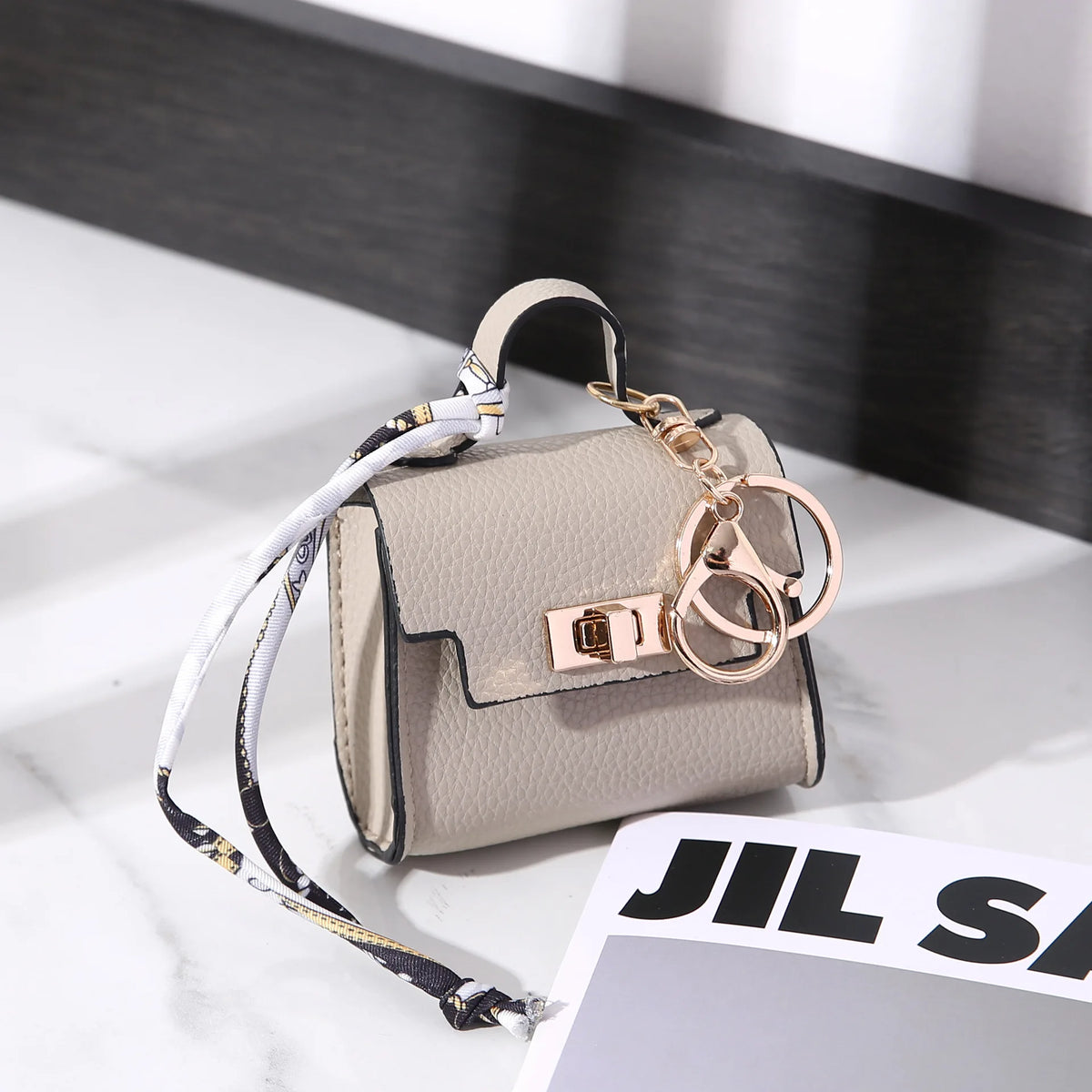 Mini Vegan Leather Bag Charm in Beige — mini vegan leather bag charm and coin purse