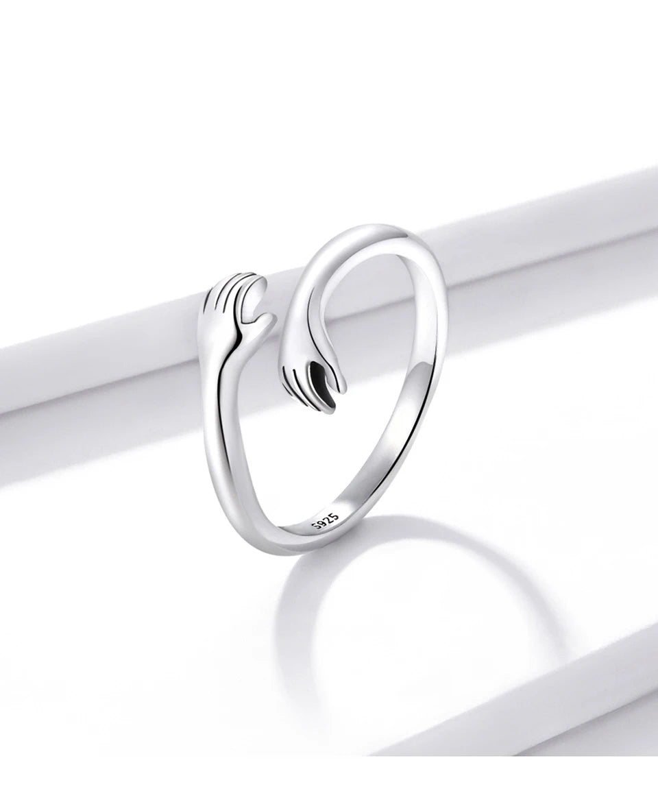 The Hug Ring — 925 sterling silver adjustable ring with two hugging hands (11)