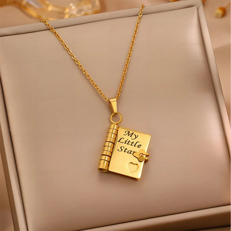 My Little Star openable book necklace in Gold — for daughter with 6 engraved pages