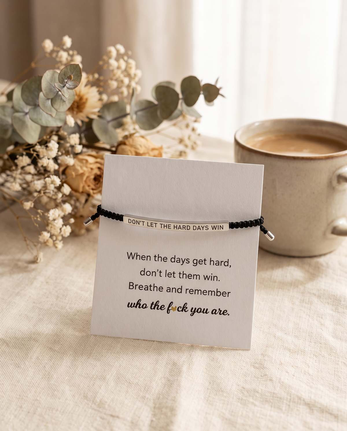 Don't Let The Hard Days Win bracelet on its message card