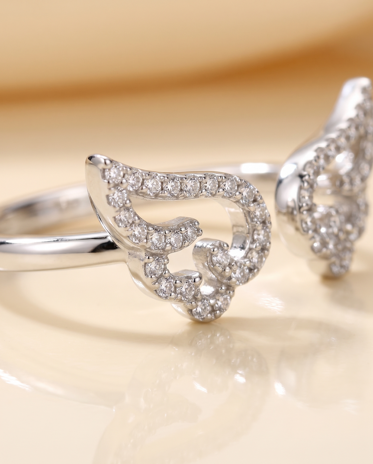 Close-up of the Angel Wing ring's open-work crystal wings