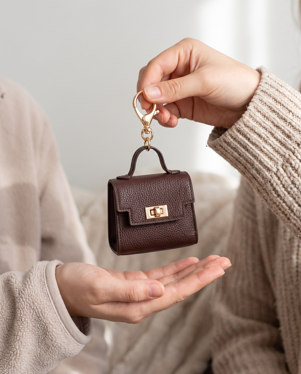 Giving the mini bag charm to a best friend
