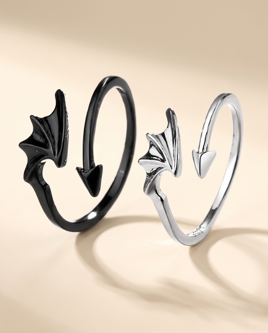 Matching black and silver devil wing and tail couple rings